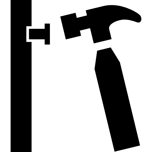 Hammer nailing a nail in a wall nail tools action icon